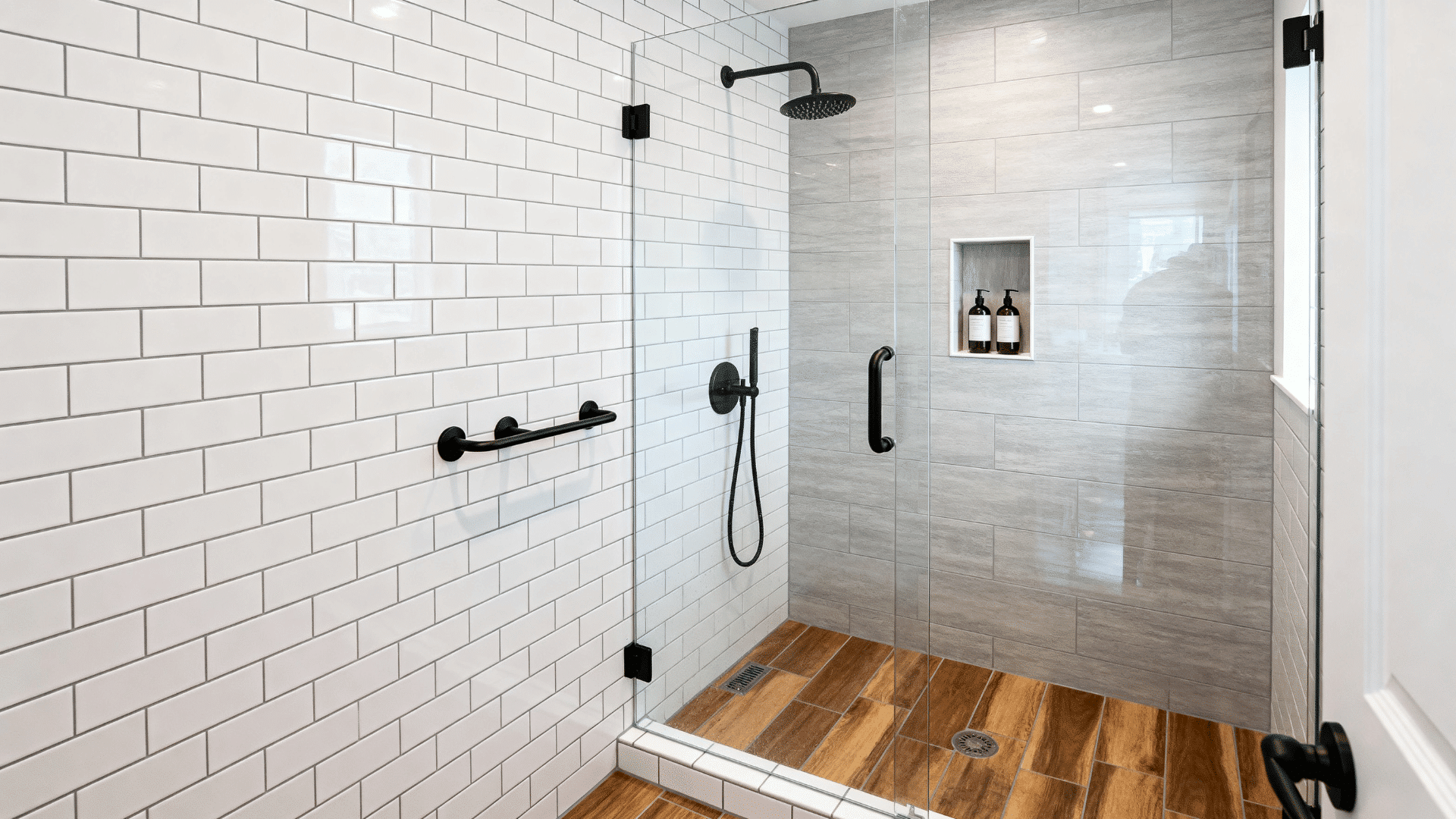 old tub space converted into a long walk-in shower with glass partition
