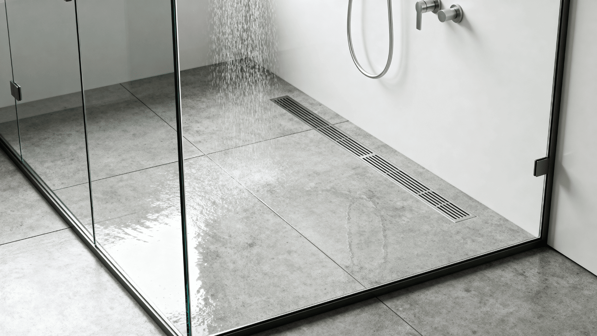 small walk-in shower floor with sleek linear drain along the back wall