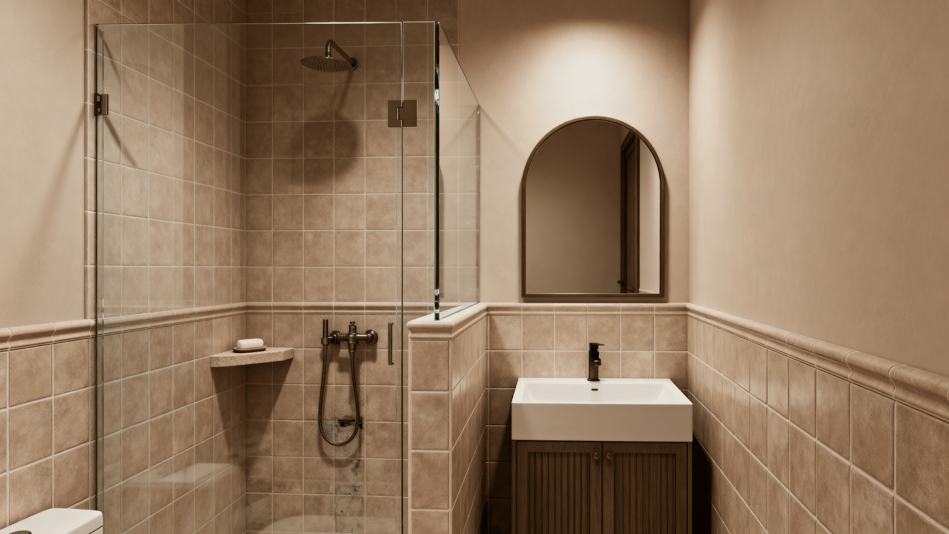 walk-in shower with half wall and clear glass for added privacy