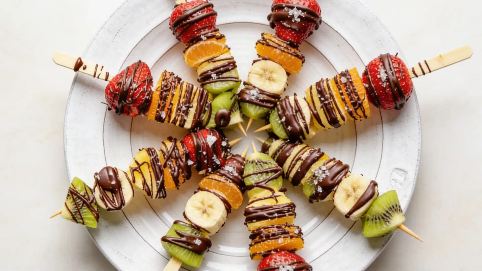 colorful fresh fruit skewers on wooden stick