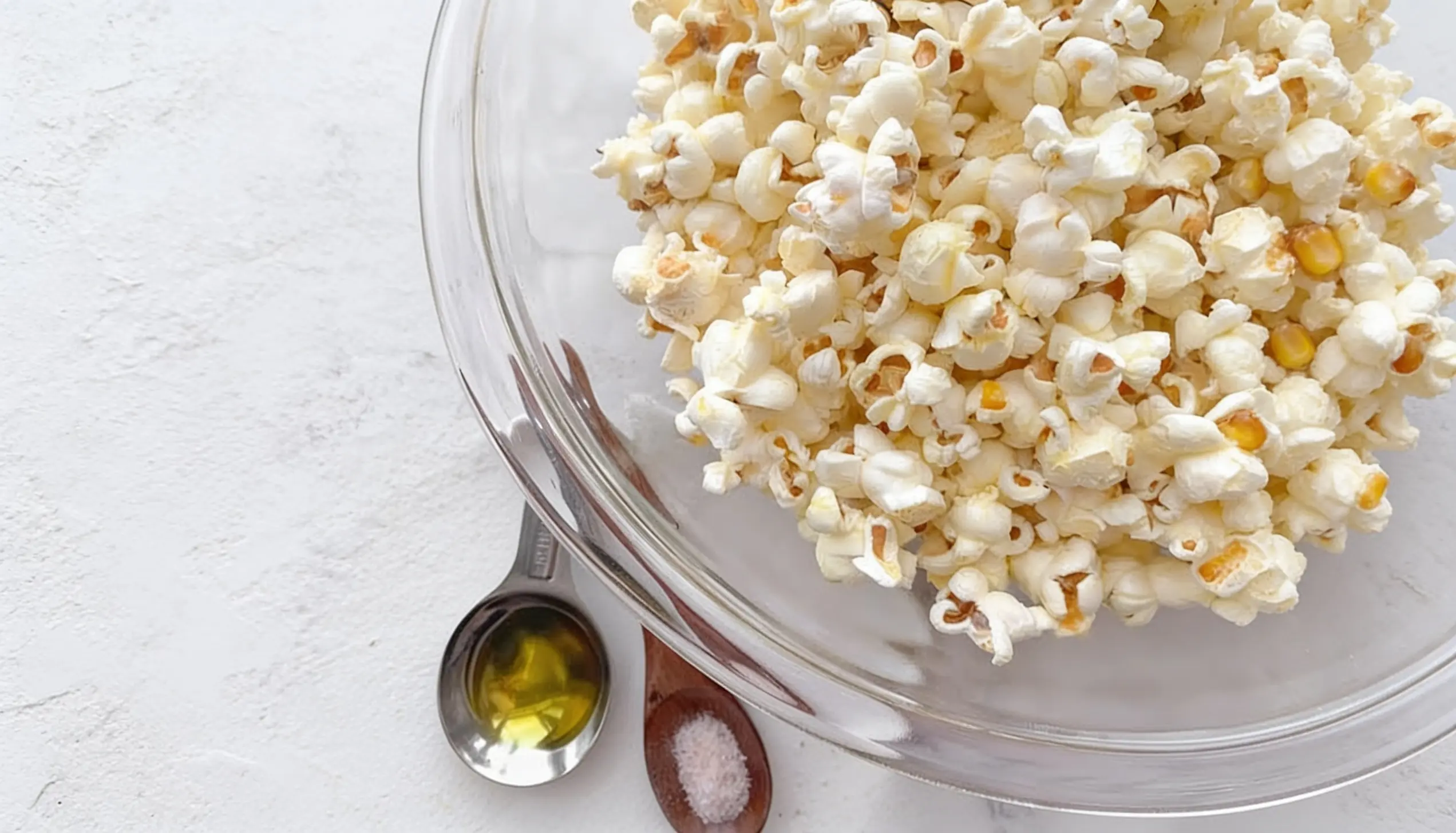 freshly air popped popcorn in white bowl