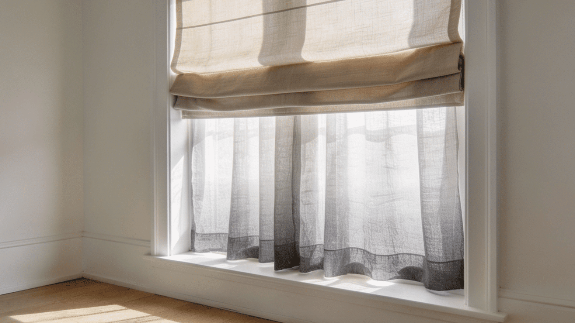 single window with layered sheer and panel curtains creating a cozy interior look