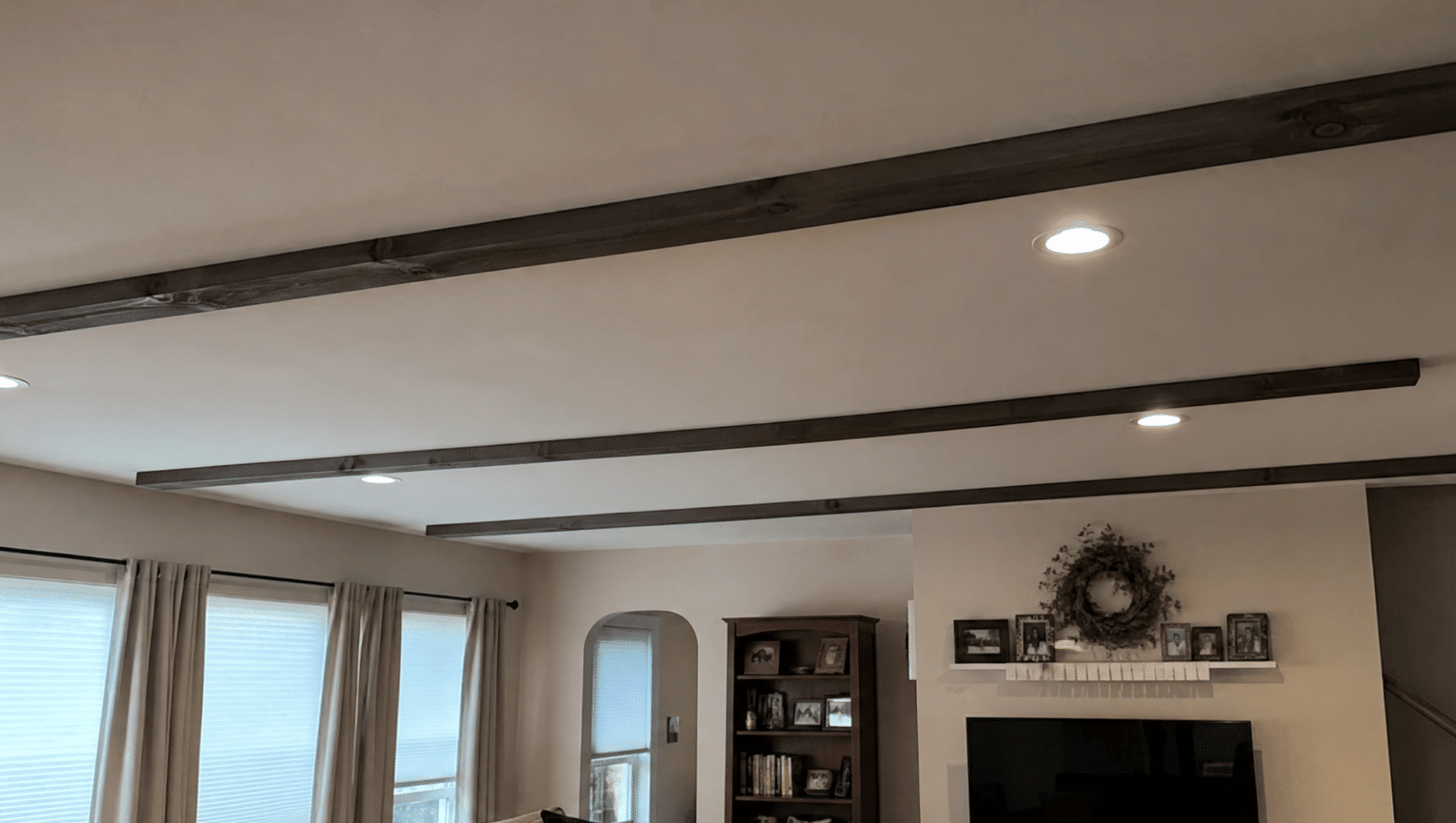 updated ceiling with simple design details adding character to a room through home renovation ideas