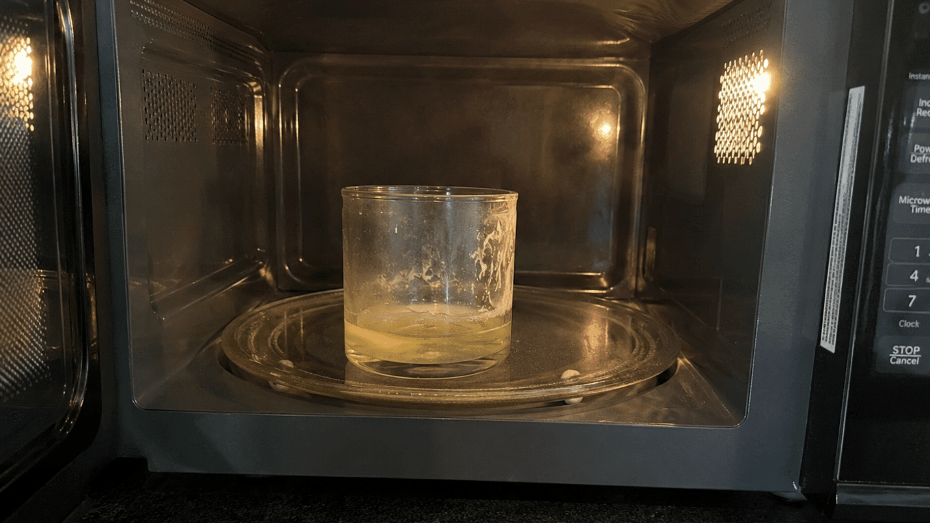 wax melted inside a candle jar after gentle microwave heating for quick leftover wax removal (2)