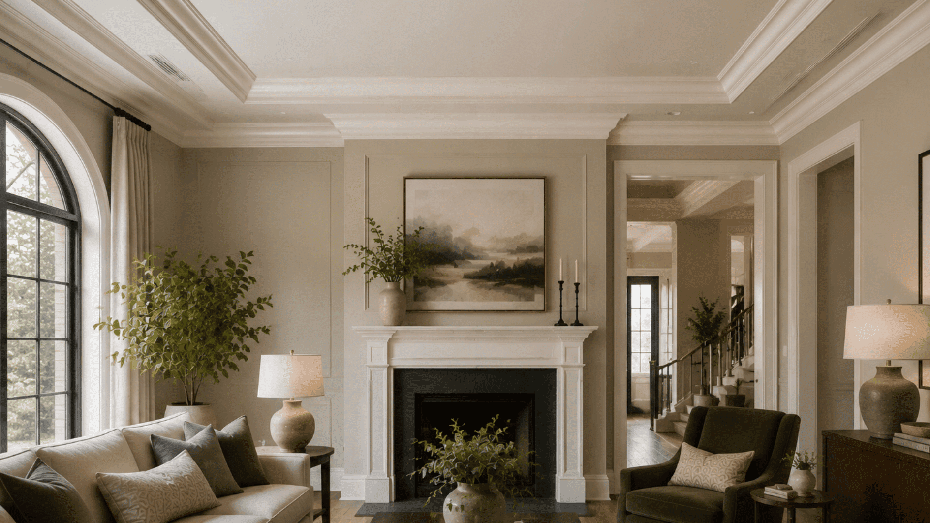 modern living room with detailed crown molding and fireplace design
